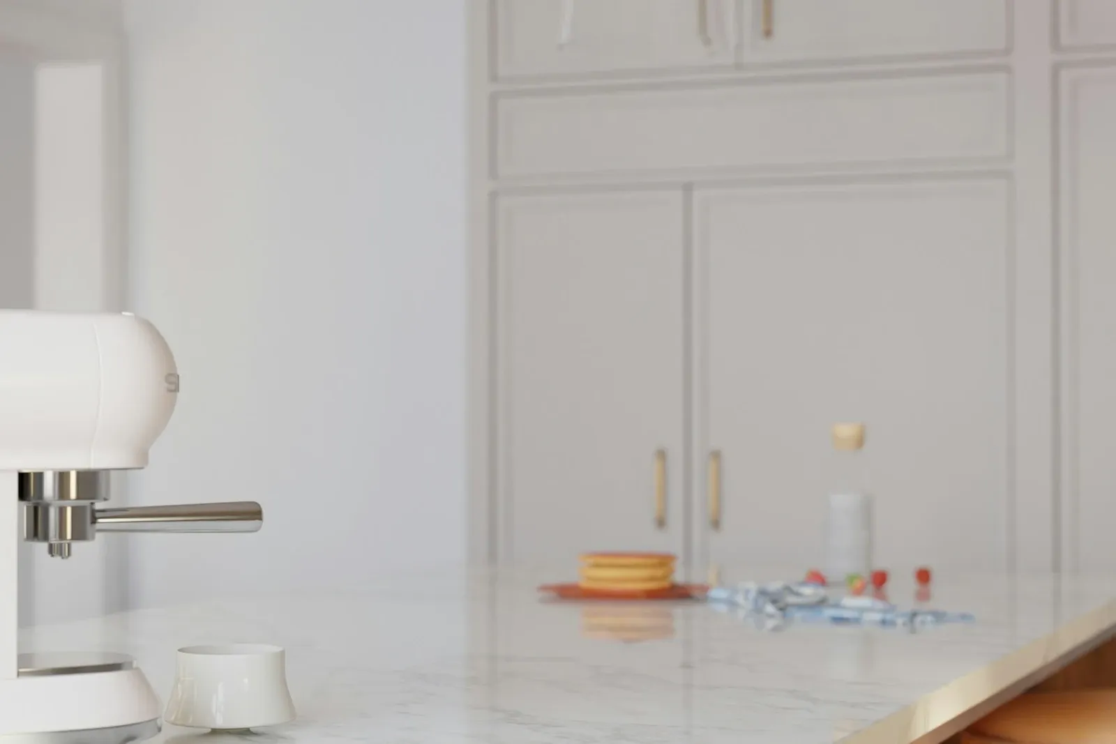 White flat-panel kitchen with a white espresso machine on a white counter and tall handleless cabinets behind